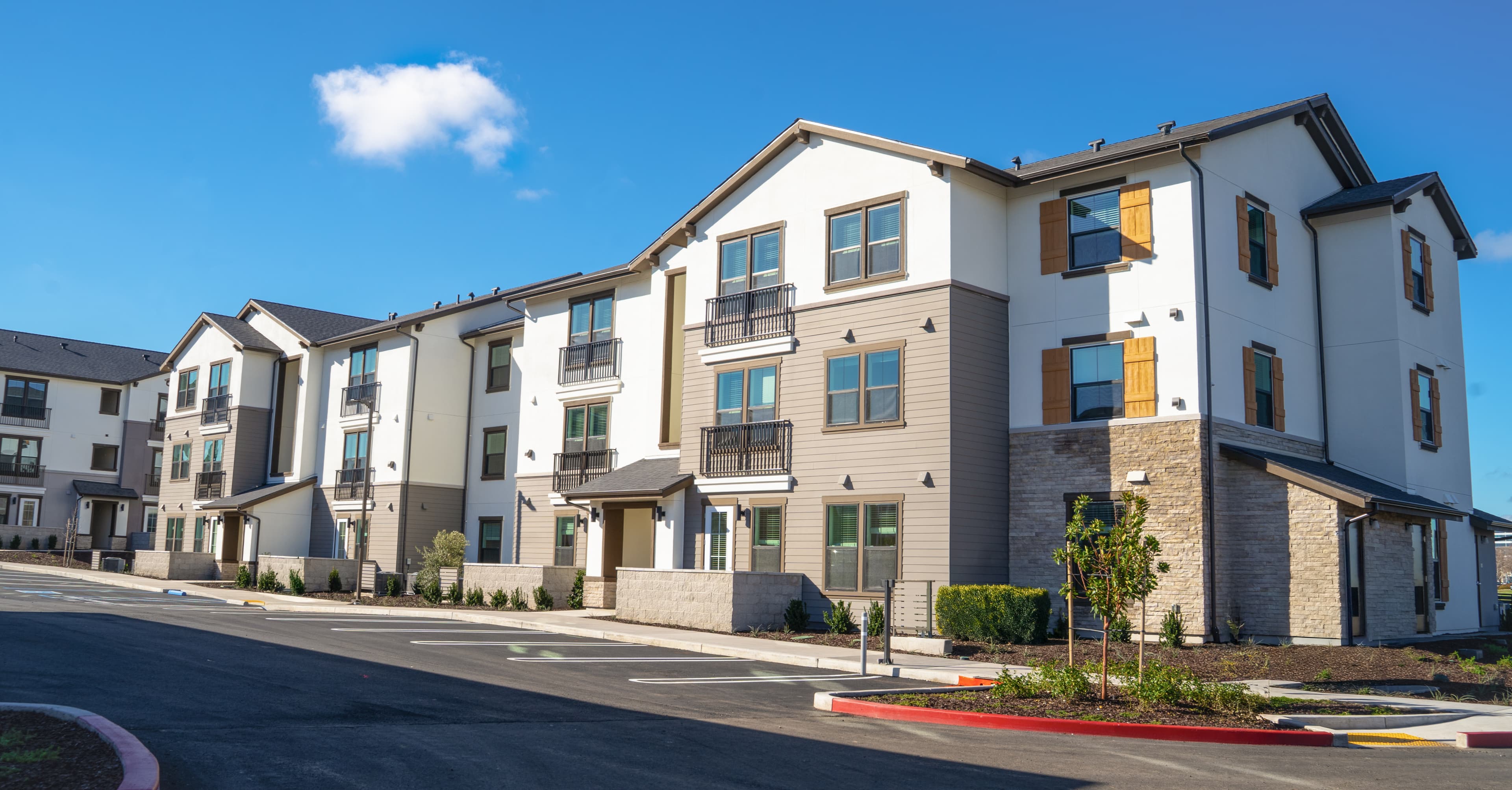 Well-maintained multifamily residential community — representative imagery
