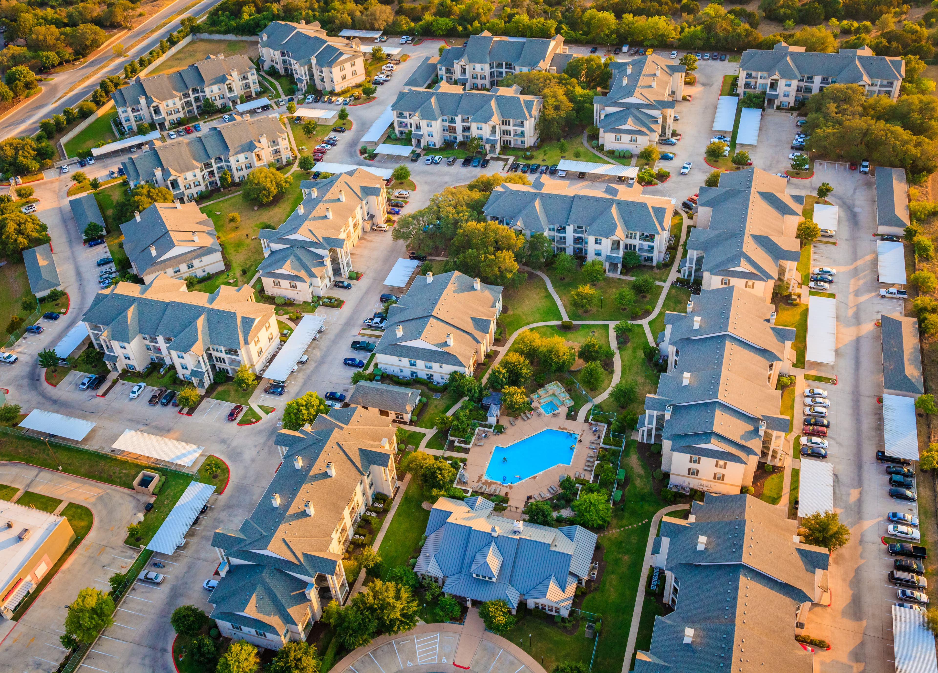 Well-maintained multifamily residential community — representative imagery